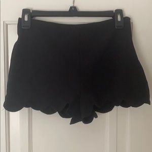 Black high waisted shorts with scallop detail!